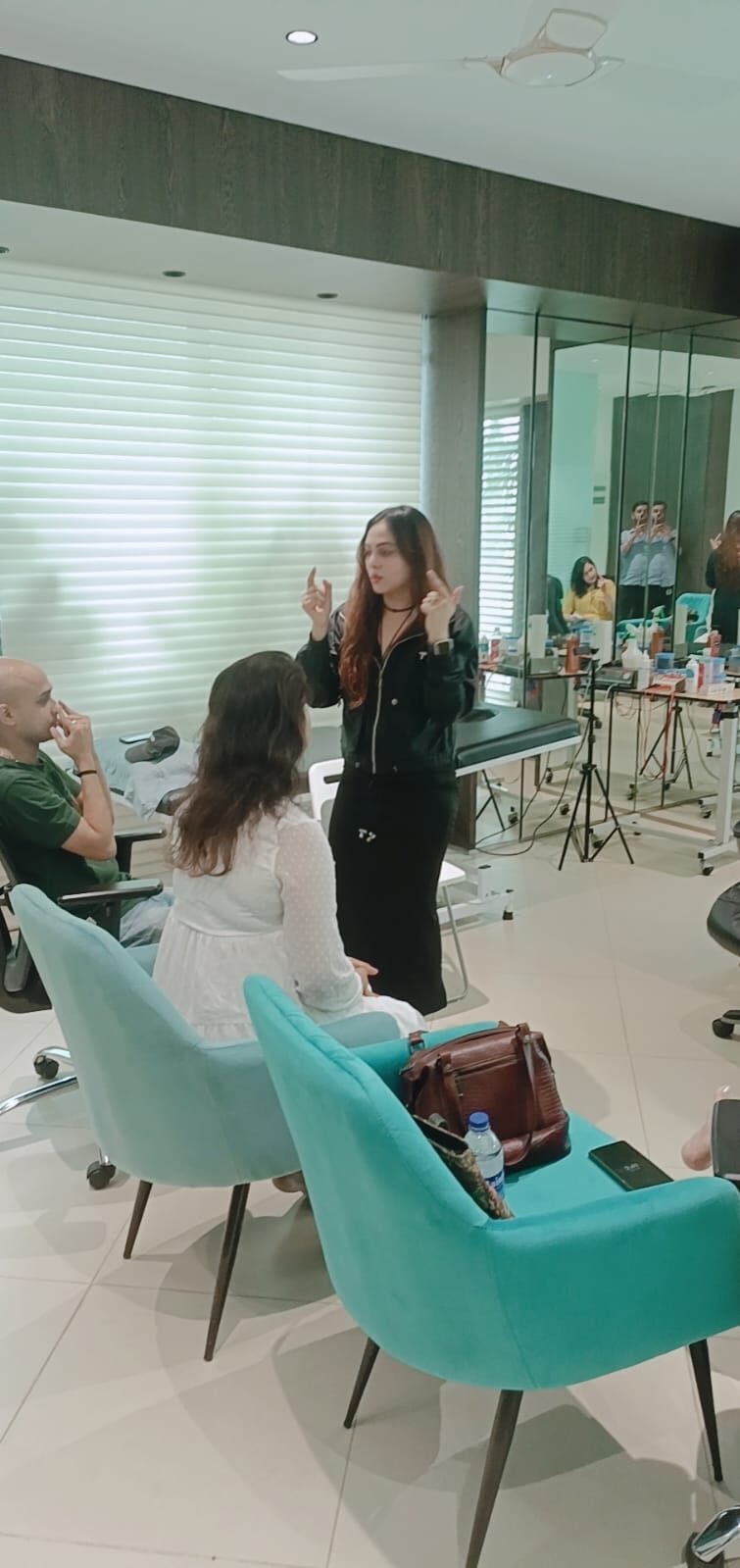 Vibha Jain standing in the consulting room where sessions take place