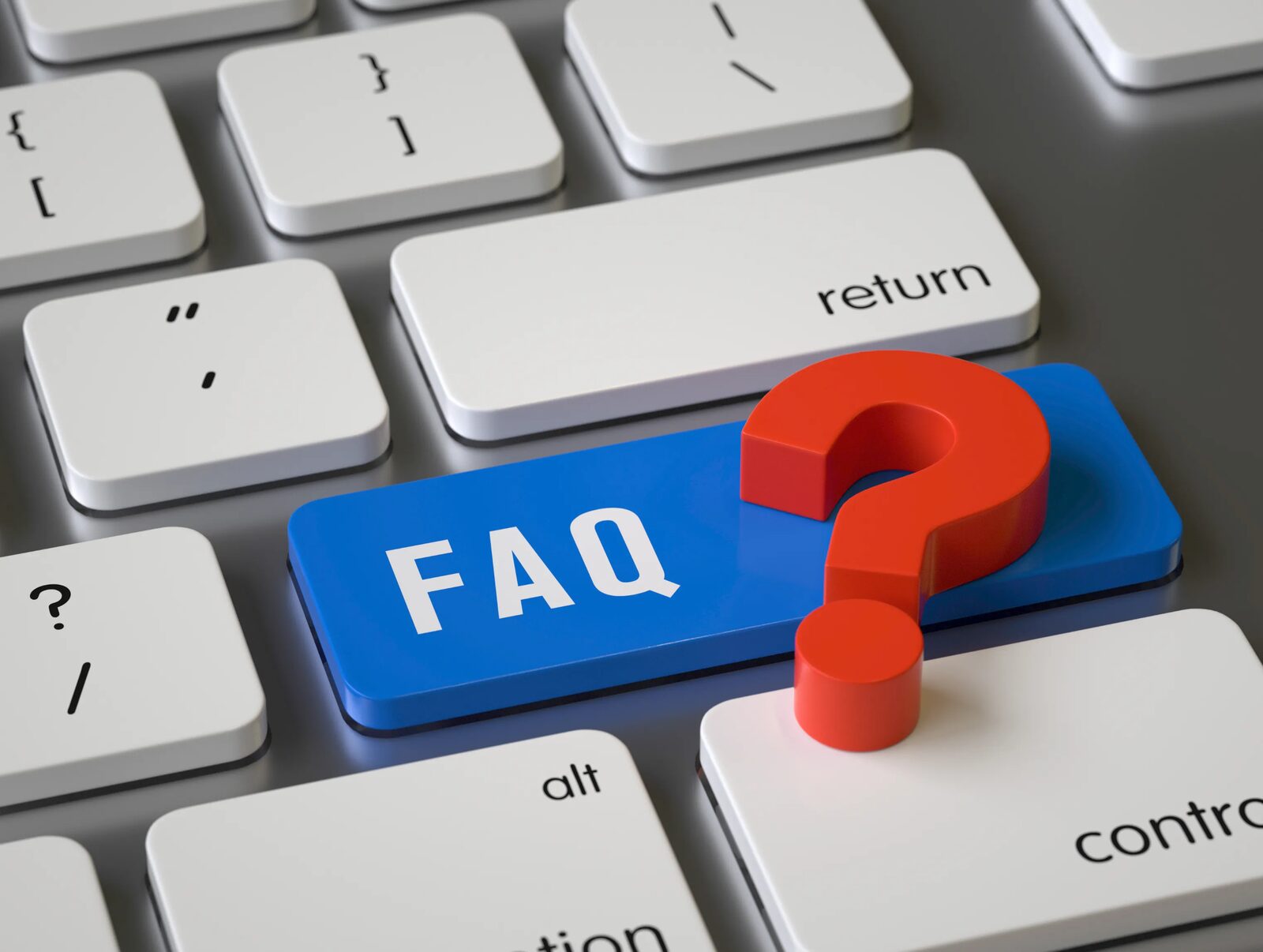 A computer keyboard key marked FAQ